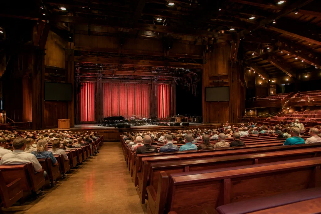 Auditorium aisles and pew-style seating inside the Grand Ole Opry House