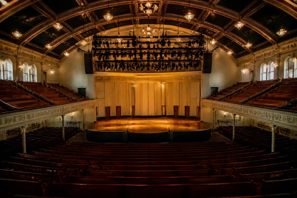 Stage and audience seating inside Ryman Auditorium in Nashville